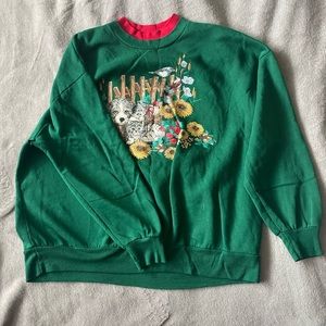 Graphic green sweater